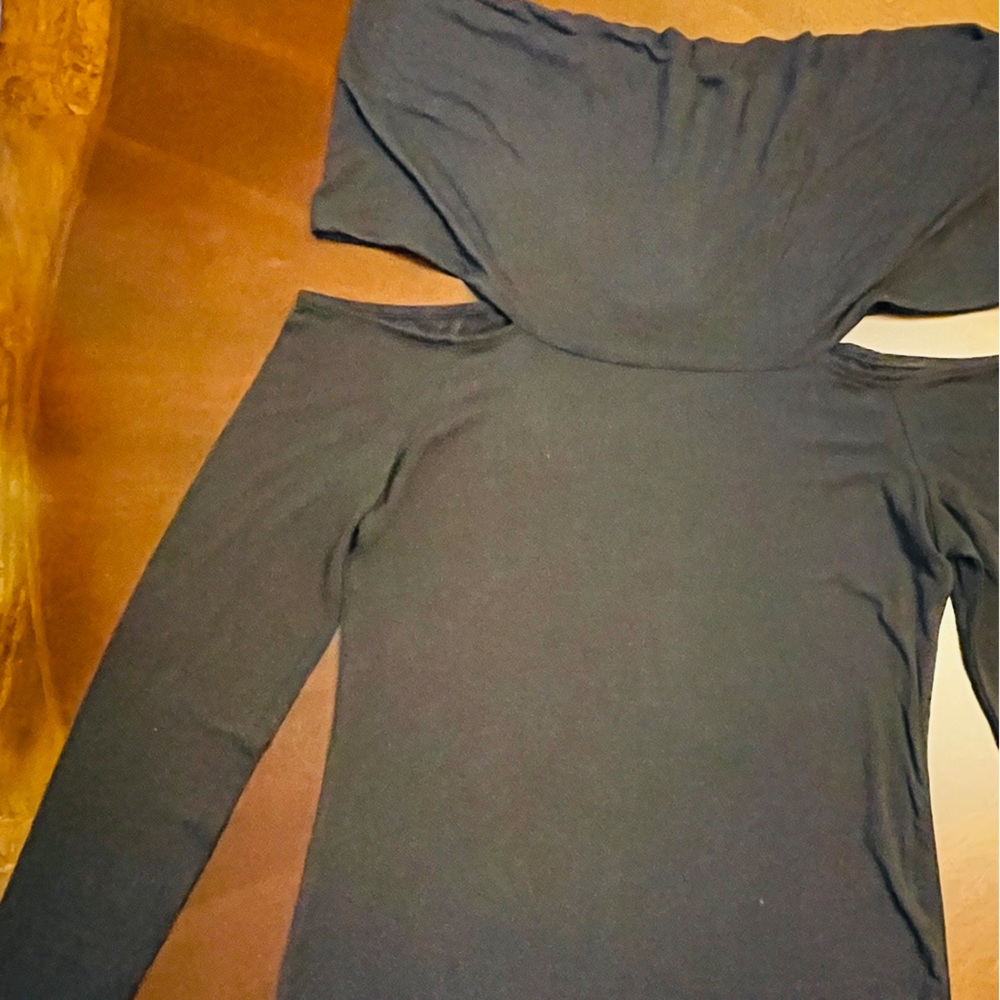 BCBG.  Like new top with open shoulders. In great condition condition.